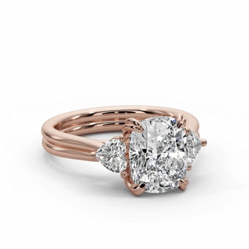 Cushion cut threestone engagement ring